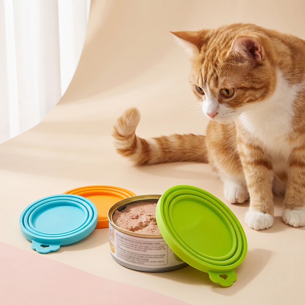 Universal Silicone Cat Food Can Lids 3-Pack studio image with cat and can